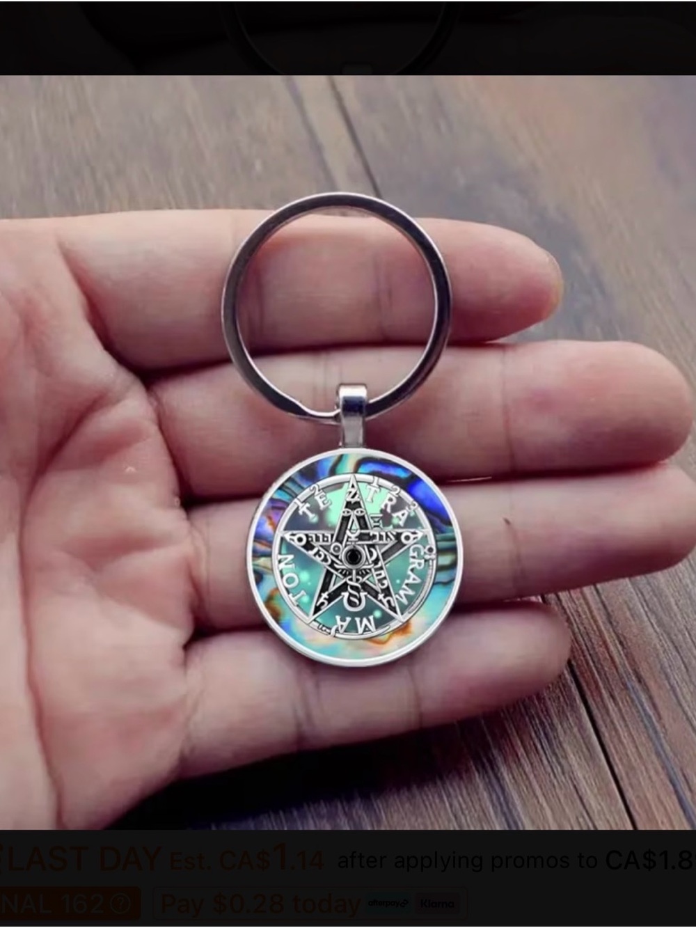 2️⃣Silvertone Pentagram Keychain with Iridescent Accent